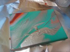 Silver paint pour w/ little red and orange. turqouise. I MADE THIS