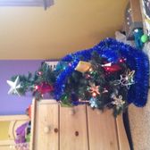 Too mcuh tinsel for a three-foot tall tree but oh well