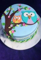 Which owl cake looks cuter?