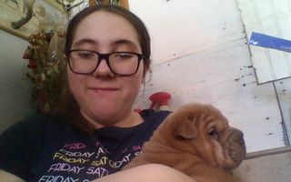 this is me with my puppy cute or no ?