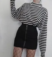 Title: striped shirt combined with an velvet black skirt & fishnets Title: striped shirt combined with an velvet black skirt & fishnets