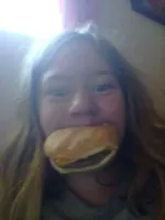 Hey, um...I'm back. This is a bit weird and all but...I came back. Here's me with a burger in my mouth. Hey, um...I'm back. This is a bit weird and all but...I came back. Here's me with a burger in my mouth.