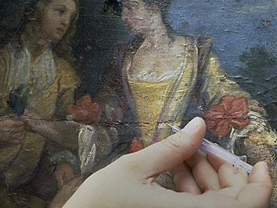 How long did it take to restore the most expensive painting?