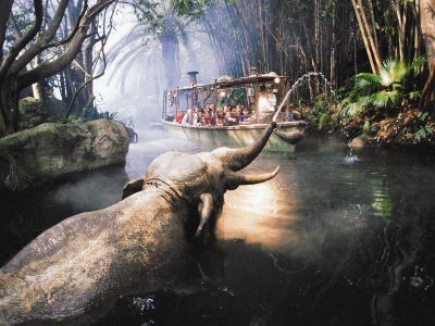 Name the ride that goes on a boat ride in Adventureland.