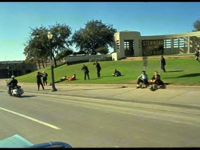 There are many alternative theories about the Kennedy assassination and the trajectory of the bullet that killed Kennedy. Rather than coming from the Texas School Book Depository, where do some believe the shots originated?