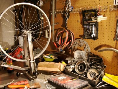 What is the purpose of truing a bike wheel?