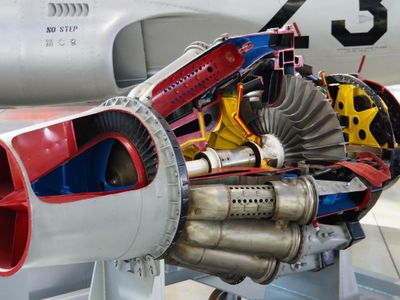 What is the main difference between a turbofan engine and a turbojet engine?