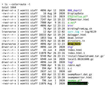 Which command is used to search for a string in a file in Unix?