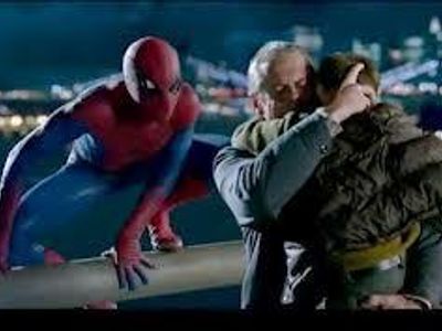 What is the name of the boy Spider-Man saves on the bridge?