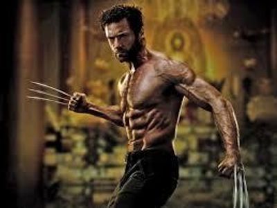 Before having adamantium claws, Wolverine's claws were made of...