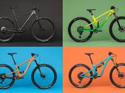 What type of mountain bike is preferred for downhill trails?