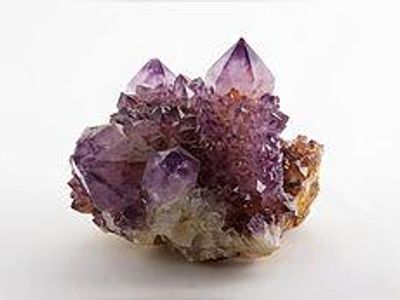 Which element gives an amethyst its purple colour?