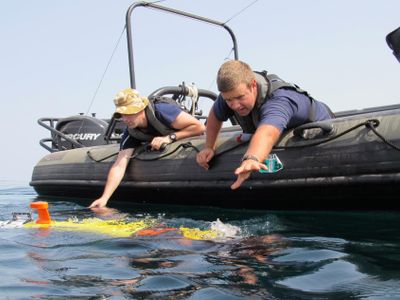 What is the recommended way to clean an inflatable boat?