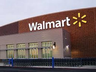 What major retail corporation did Walmart acquire in 1999?