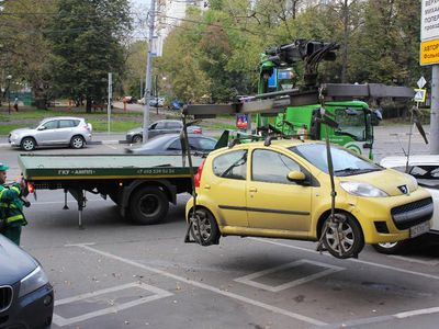 Which truck is commonly used for towing disabled or illegally parked vehicles?