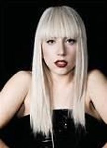 Do you think lady gaga is ugly ? (hey im just asking becuase my cousin is asking me 10 times!