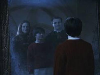 which one of these characters was teh professor who told harry at the end of their conversation that he looked very much like his father and had also inherited his fathers talent for trouble?