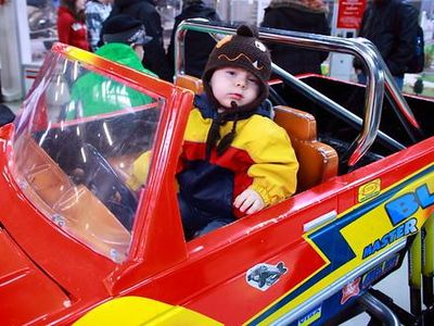 Who is the first female monster truck driver to win a racing championship?