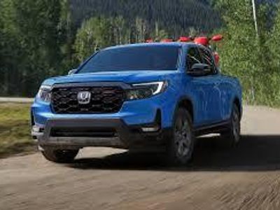 Which automaker is known for the Ridgeline truck?