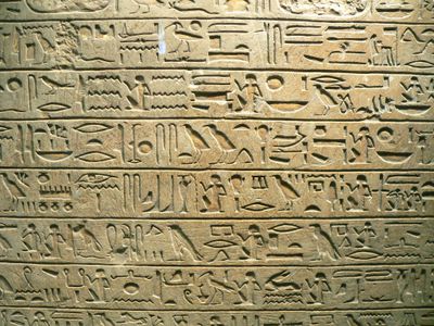 What did Ancient Egyptians use to write on?