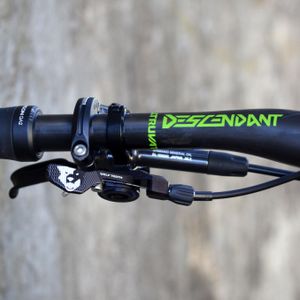 What is the purpose of a dropper post on a mountain bike?