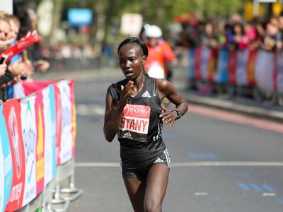 In which country was the Women's world record Marathon time set?