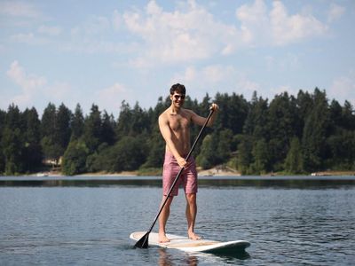 Which activity is NOT commonly done on a paddleboard?