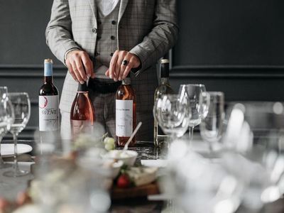 What is the purpose of a sommelier in fine dining?