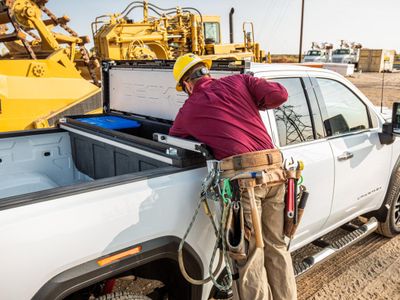 Which material is commonly used for durable truck bed storage boxes?