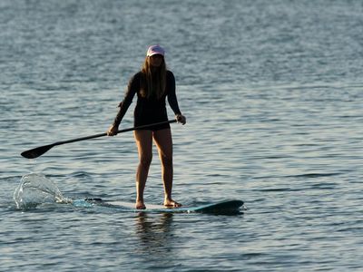 What is the approximate length range of a paddleboard?