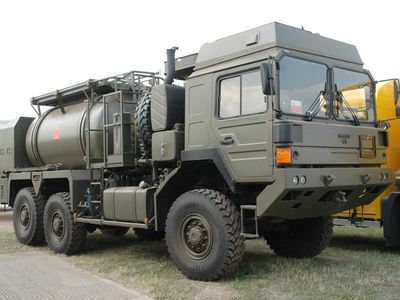 Which type of truck is primarily used to transport military personnel and equipment?