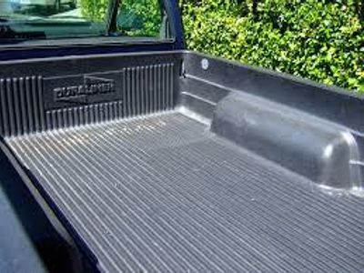 What is the purpose of a bed liner?