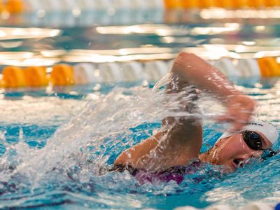 What is the term for a swimming competition where all four strokes are swum in sequence?