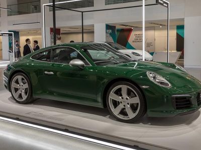 Which automotive company produces the 911 series of sports cars?