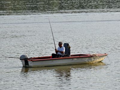 Which type of fishing boat is specifically designed for freshwater fishing?