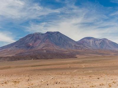 What are tall volcanoes with violent eruptions called?