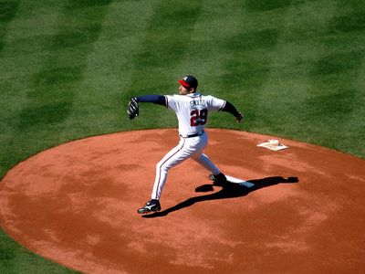 Which position is responsible for pitching the ball to the opposing team's batters?