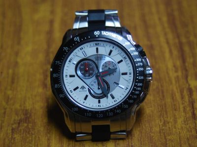 What is the purpose of a tachymeter scale on a watch?