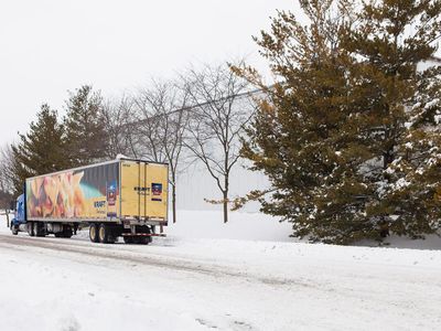 Which type of truck is used to transport refrigerated goods and perishable items?