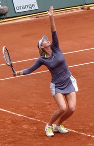 In which tournament was mixed doubles first played at Roland Garros?