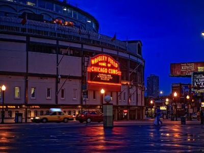 Which ballpark is known for its iconic ivy-covered outfield walls?