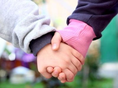 As a punishment for fighting at school, two kids could either be suspended or hold hands for an hour.