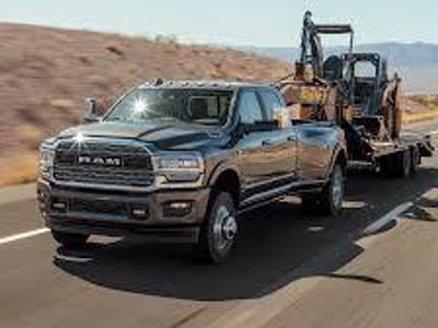 Which brand is known for its trucks with the highest towing capacity among pick-up trucks?