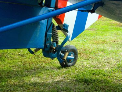 Which part of the airplane helps with steering on the ground?