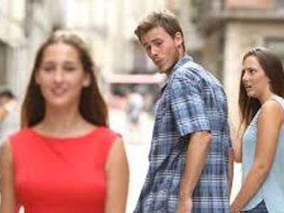 Which meme features a man looking at another woman, while his partner looks displeased?