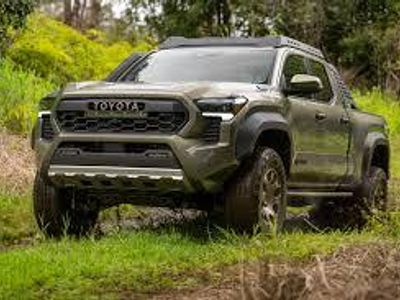 Which Japanese manufacturer produces the Tundra and Tacoma trucks?