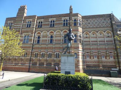 Which college is associated with the origin of rugby?