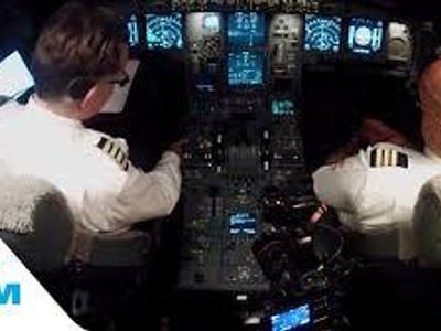 How do air traffic controllers communicate with pilots?