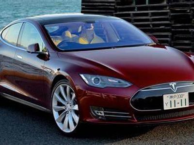 What luxury car brand produces the Model S and Model X electric vehicles?