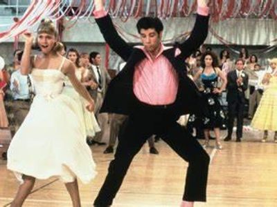 Name the type of Waltz performed in the musical movie Grease?